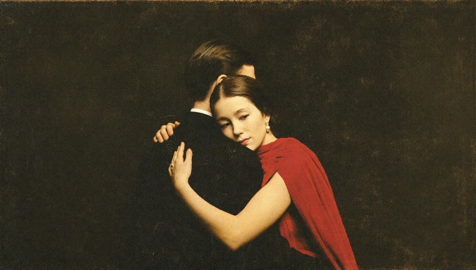An elegant couple in formal wear embracing against a painterly backdrop